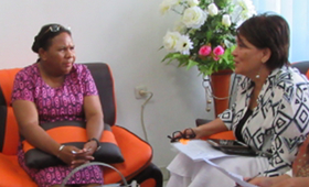 Head of Jayapura District Planning Agency Hanna Hikoyabi (left) discusses elimination of violence against women and girls with UNFPA Representative Dr. Annette Sachs Robertson.